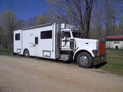 22006169-574-Beautiful-White-Race-Car-Motorhome.jpg