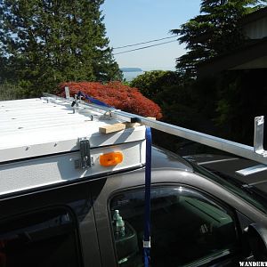 Canoe load bar on rack