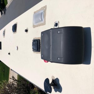 Roof of RV before Solar was added.  You can see the basement access panel just to the right of the AC unit.