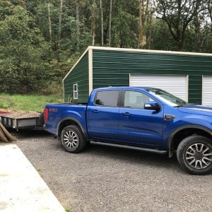 Ranger hauling rock