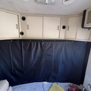 made a triple purpose curtain between cab area and ‘house’ - high quality blackout fabric, adds privacy, blocks light and amazing insulating propertie