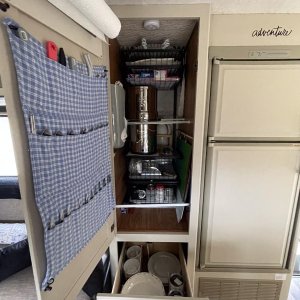 Berkey water filter in the pantry alongside vertical storage for silverware - prevents jangling utensils and makes it super quick and easy to find wha