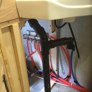 Hot water header by water heater