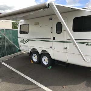 Carefree awning, supports can unhook from body and be vertical