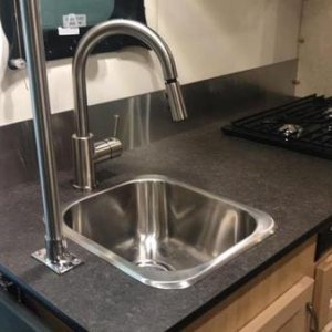 Kitchen with Stainless Backsplash