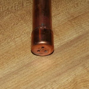 Drilled holes in 1/2" Copper Cap