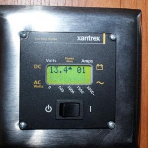 Xantrex Inverter control panel inside motorhome.  Mounted just above the motorhome control center which houses the slide, water pump and water heater 