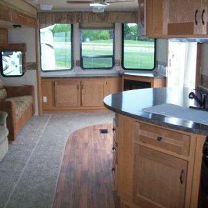 Front bay windows w/hutch, and kitchen area