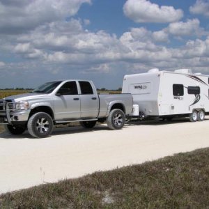 Truck and trailer down the shell road