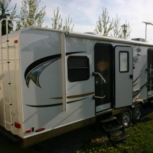 Exterior View From Rear
(Rear Ladder & Power Awning Visible)