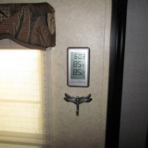 Not really a mod but like the looks of this hook to hold keys and put on an inside/outside thermometer next to the door.