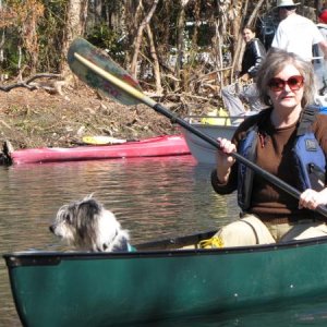 DW and her dog on the river.