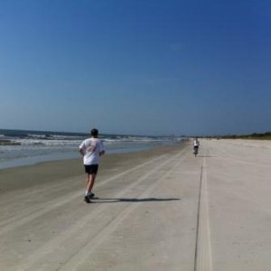 Bike ride on beach.  Lucille up ahead.