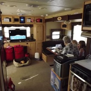 Great grandma and the girls getting some TV time. Hey ! Were supposed to be camping !!