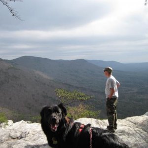 Taylor and Spartacus at an overlook at Cheaha State Park