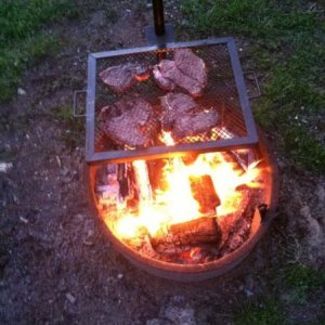 Steaks on the open campfire.