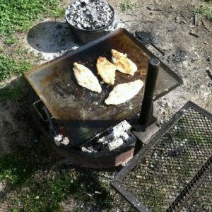 Breaded fresh catfish on the campfire.