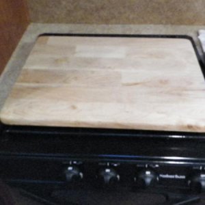 Tv tray made into the stove cover/ extra counter space