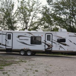 There she is!  Our first sighting of our first TT, on the lot at Wana RV, Shipshewana, IN, fresh from the factory on 5/8/2012.  Sweet!