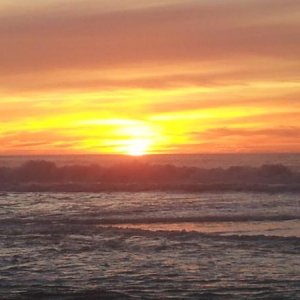 Half moon bay at sunset