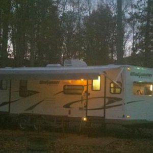 Cherokee NC Camp Ground after dark; Wife waving in front window