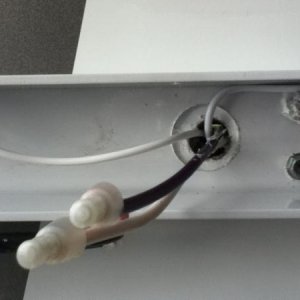 Controller extension wire through the awning power wire hole into the interior