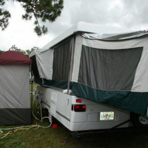 moving up to a pop-up Coleman 2002!
With exterior shower and toilet!