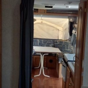 2003 Roo 25 has a U shaped dining area, unlike the 2004 model.