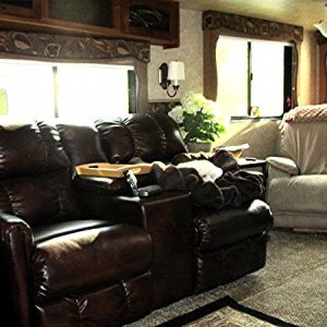 Theater seating and dining room removed and replaced with LazyBoy Power recliner!  Perfection!