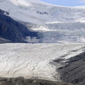 The Athabasca Glacier near Jasper, Alberta. Just to the left of center in the photo, the dot you see is a trundra buggy, which is the size of a school