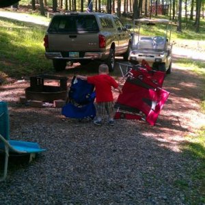 Helping grandpa by turning all of the chairs over....LOL