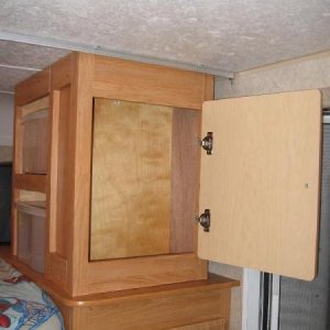 Shallow cabinet, wife uses for her bathroom tote.