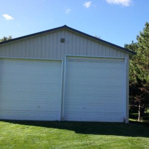 Raised door for tall fifth wheel.