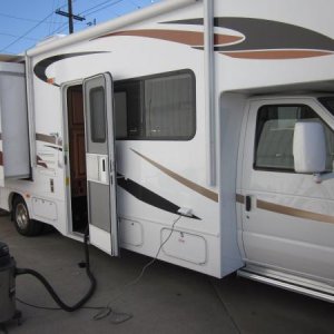 RV with rear slide out.  The rear slide is the cabinets, not the bed.  In other Sunseekers, the bed was on the slide, and cold air came in through the