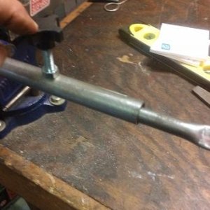 May use locking bolt with knob, but will probably end up welding rod on top of a bolt to give more leverage when tightening.