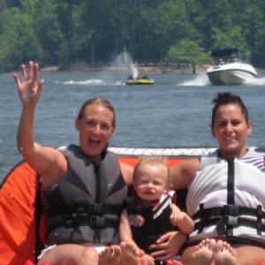 Getting our grandson on the water at an early age with mom and aunt Kel...Memorial Day 2011