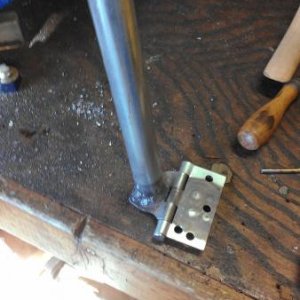 Hinge welded to end of support leg