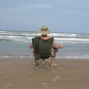 Dutch on beach in South Padre, singing...

Got my ass in a lawn chair, toes in the sand,
Not a worry in the world, a cold beer in my hand,
Life is goo