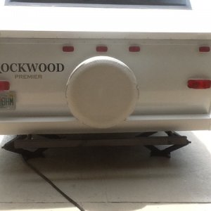 5"X5" vinyl fence post cut to fit and attached to rear bumper