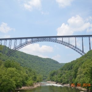 New River Gorge Bridge.  From the river level to the peak of the arch in the bridge, you can stack the Washington Monument and the Statue of Liberty t