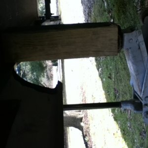 (sideways pic)
Use a floor jack to hold / raise and lower slide.