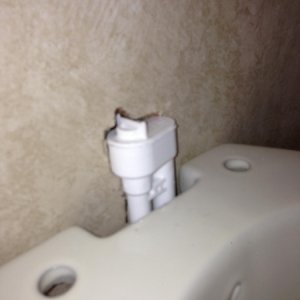 with lid removed the water valve still hit the wall. i thought that someone sitting on it would eventually break it so i relieved the wall around the 