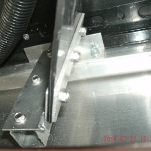 Some stainless self-drilling screws to anchor the hinge on the slide.