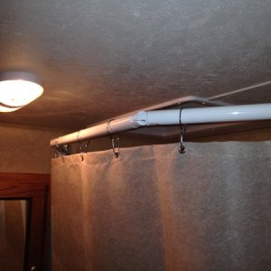 Replaced shower rod with an adjustable one, to provide more room.