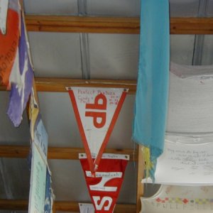 Our flag hanging in the Chat n Chill, Stocking Isl. Bahamas. This was at the end of our last trip, 4-13-05.