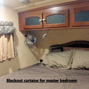 Added thermal blackout curtains to master bedroom