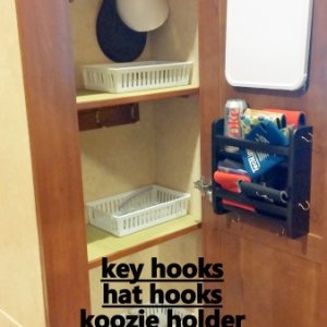 Added hooks for hats and keys, message board, bins for wallets and phones, and a koozie holder to the front closet by the entry door.