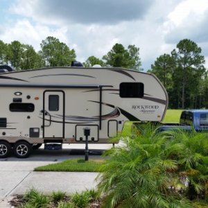 New truck and fifth wheel on street