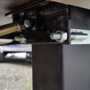 Winfield RV Cross Brace Stabilizer. Top mount clamps around front leg. Simply clamps to the outer landing leg surround, with a U bracket and a couple 