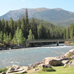 This is Maligne River in Jasper National Park.  You can pull over and have a picnic with fire pits.  Nice spot.  Farther up the road is the Maligne Ca